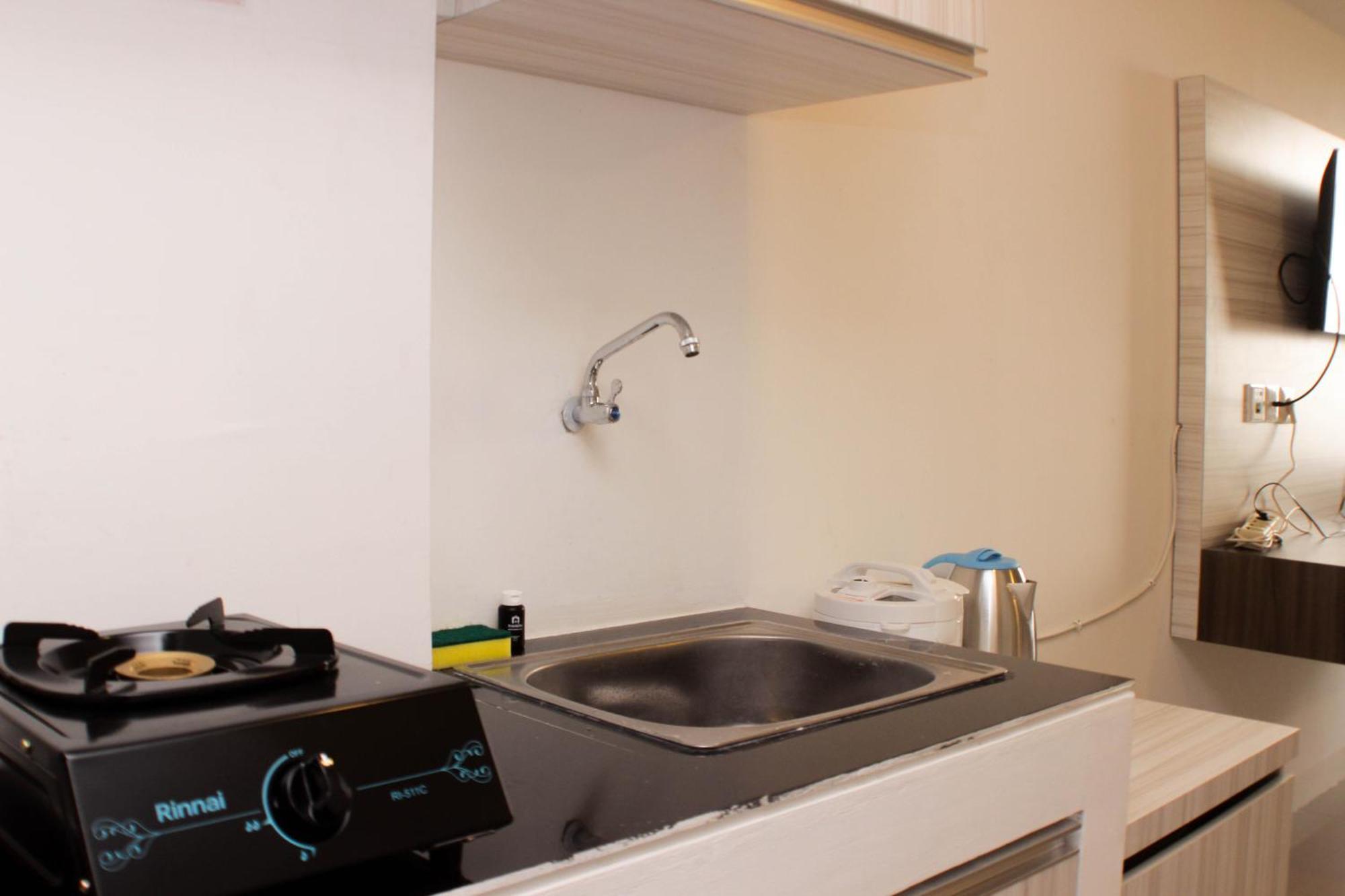 Cozy Urbantown By Travelio Apartemen *
