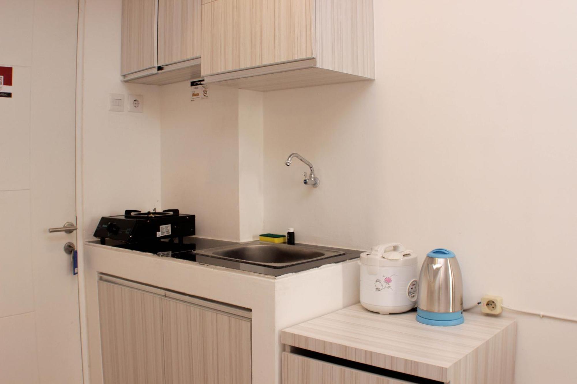 Cozy Urbantown By Travelio Apartemen *