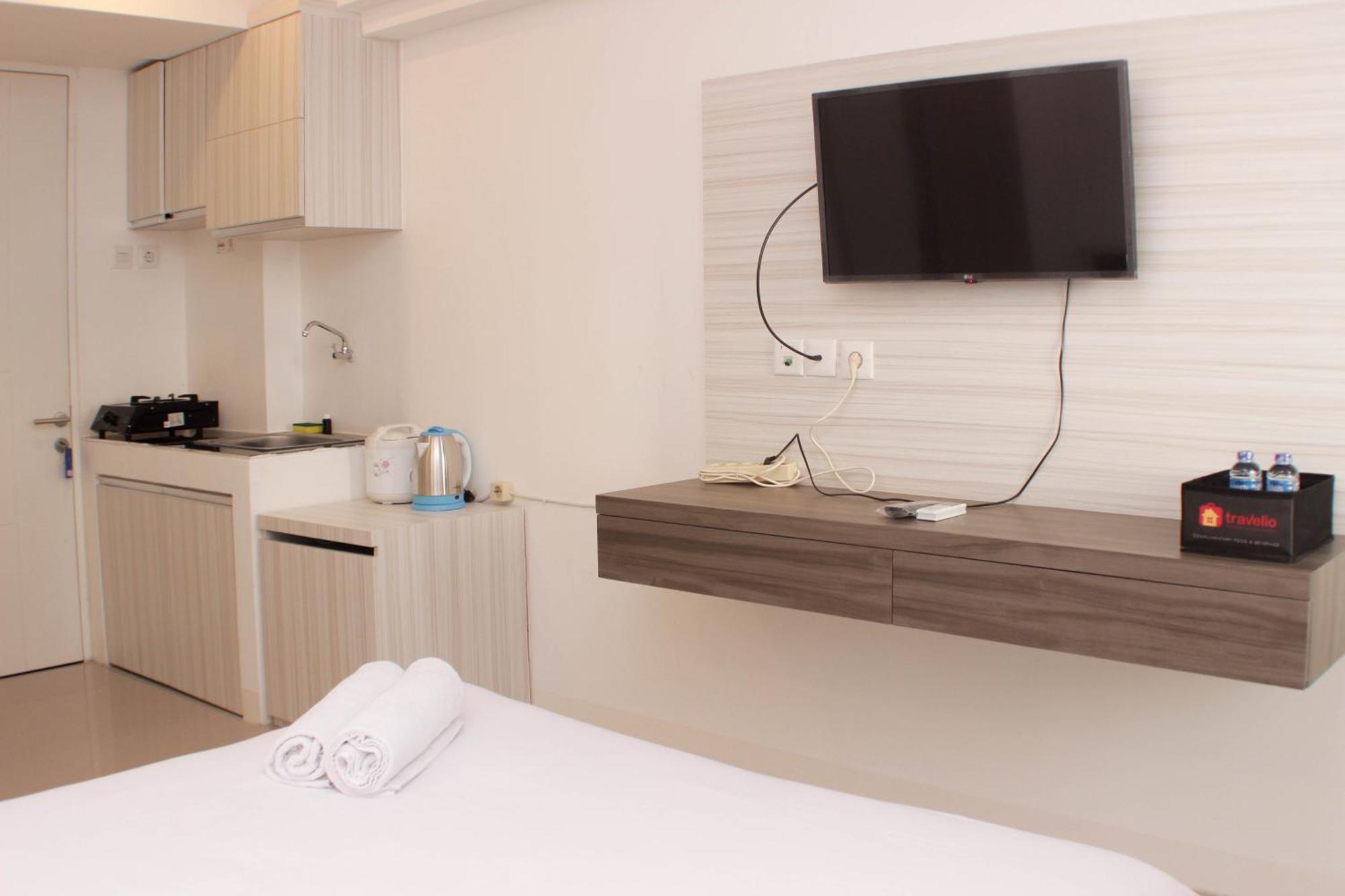 Apartemen Cozy Urbantown By Travelio *